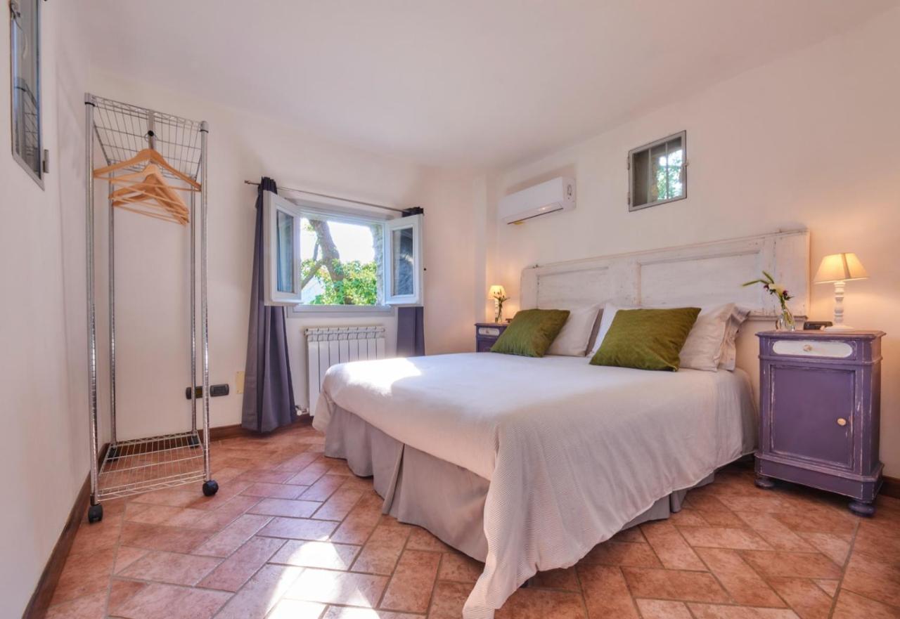 La Casetta Nel Bosco - Hot Tube And Sauna เลียร์นา ภายนอก รูปภาพ